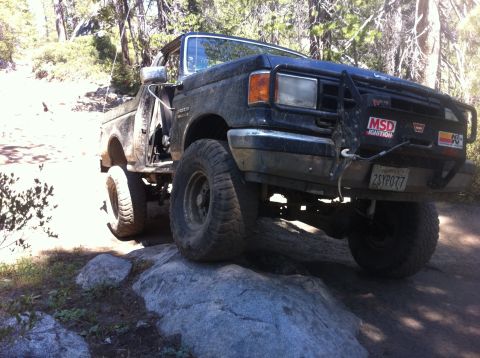 1990 Ford Bronco - This Ford F-Series truck is equipped with a heavy-duty bumper and off-road tires.