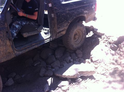 1990 Ford Bronco - This 1990 Ford Bronco is navigating a rocky off-road path.