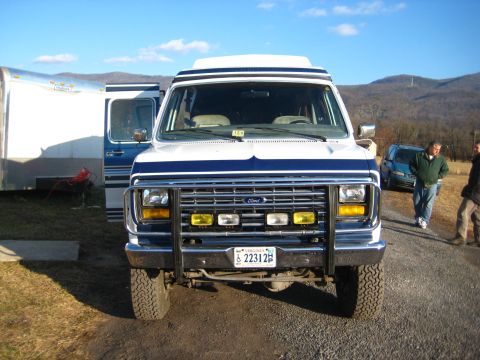1988 Ford E350 - Front view of a 1988 Ford E350 van, equipped with a heavy-duty push bumper and extra lights.