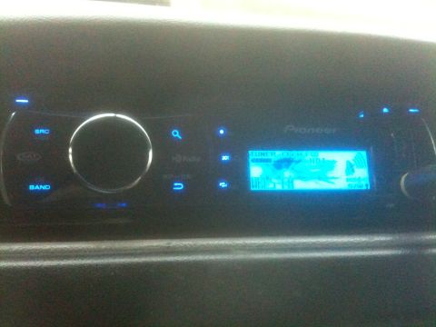 1996 Ford Bronco - A Pioneer car stereo is visible in the interior of a vehicle.