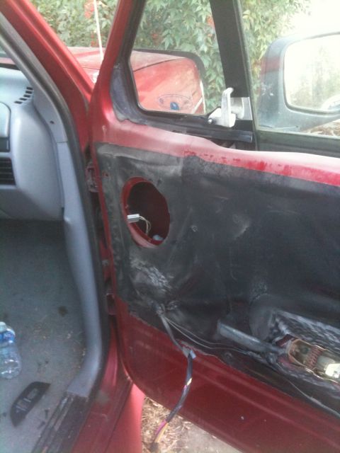 1996 Ford Bronco - Passenger side door with trim panel off.