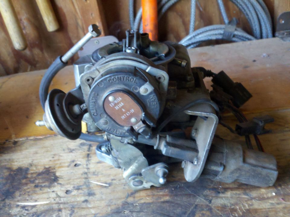 Ford 2150 carburetor with part number 210-15A 3616A visible
