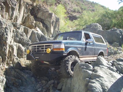 1993 Ford Bronco - This 1993 Ford Bronco navigates a rocky off-road path.