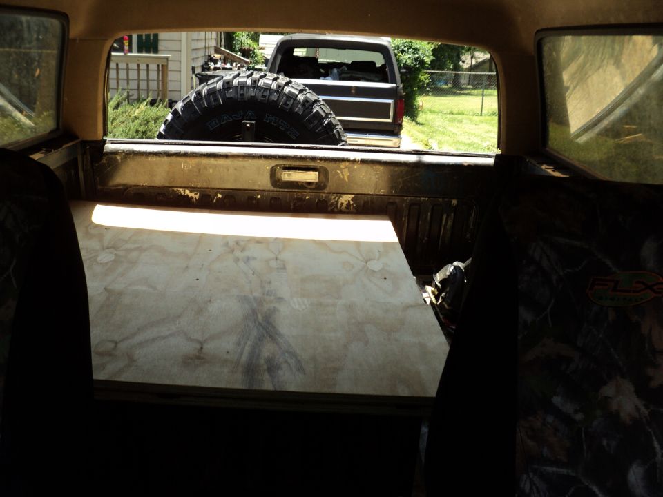 1986 Ford Bronco rear view with spare tire in bed