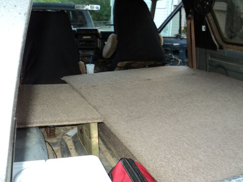 1986 Ford Bronco - Custom carpeted platform installed in the rear cargo area of a 1986 Ford Bronco.
