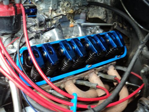1986 Ford Bronco - Close-up view of engine components, including valve covers and wiring.