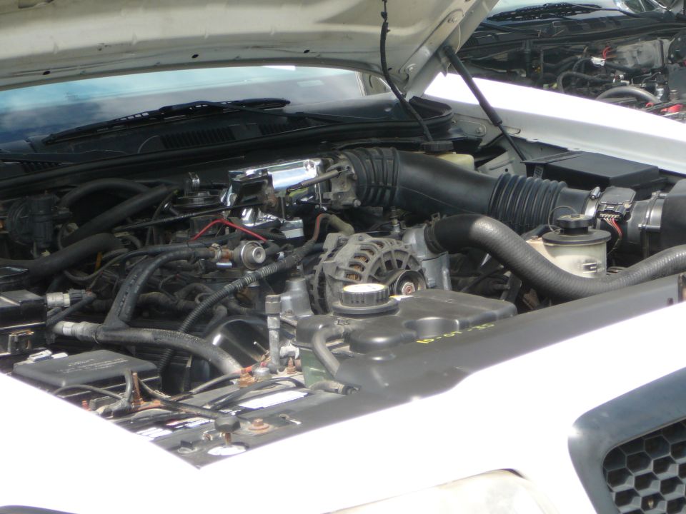 1999 Mercury Grand Marquis engine bay with V8 engine components visible