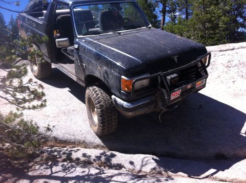 1990 Ford Bronco - This 1990 Ford Bronco is navigating a challenging rocky trail.