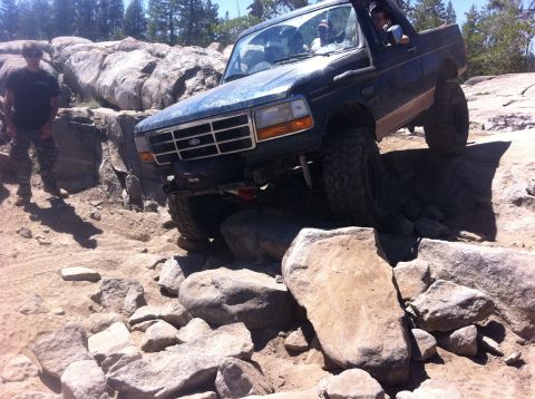 1990 Ford Bronco - Ford Bronco tackling a challenging rock crawling course.