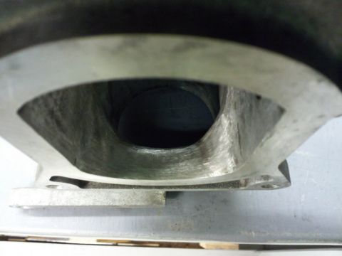 2000 Mercury Grand Marquis - Close-up view of an intake manifold port, showing the internal passage.