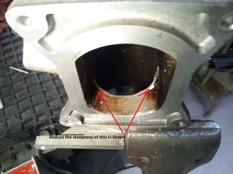 2000 Mercury Grand Marquis - This photo shows a modified engine intake manifold port, with instructions to alter its shape.