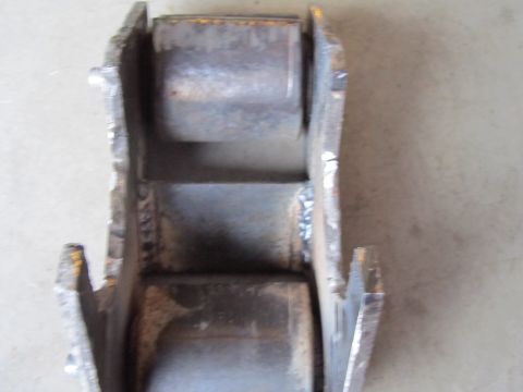 1984 Ford Bronco - This is a close-up view of a fabricated metal part, likely from a vehicle's suspension system.