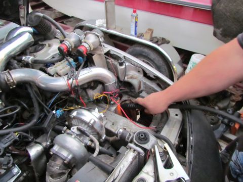 1995 Ford Probe - Custom engine modifications are visible in this engine bay, including twin turbochargers and extensive piping.