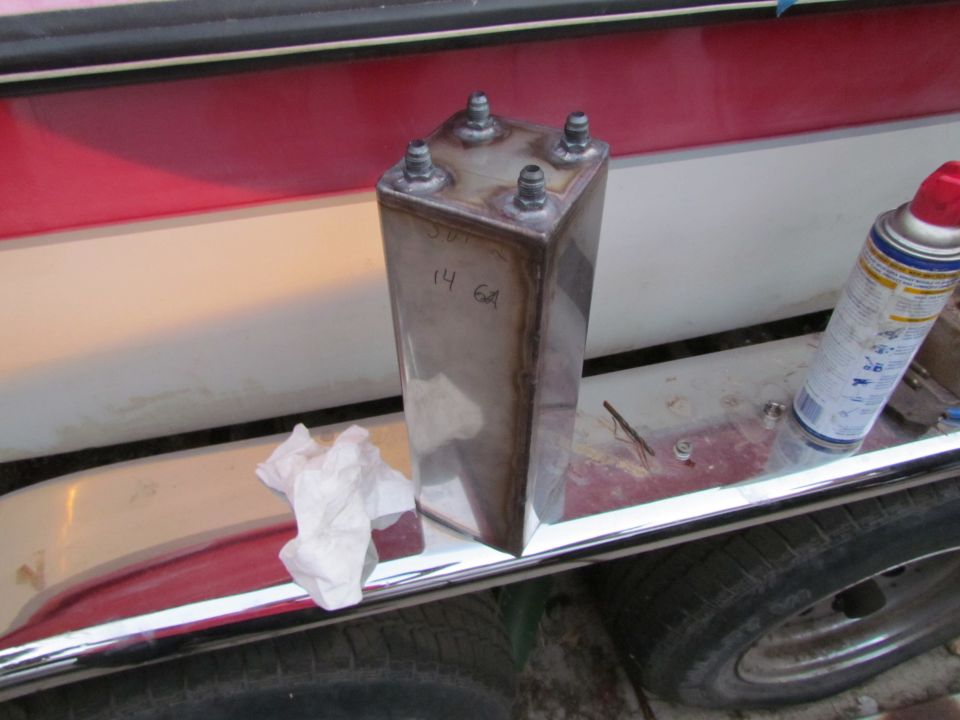 Custom metal fuel tank with four fittings and handwritten '14 6A'