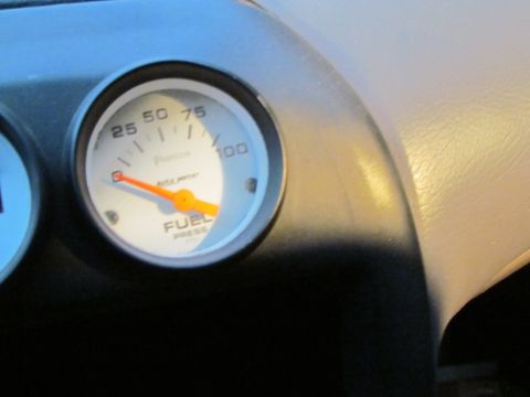 1995 Ford Probe - A fuel pressure gauge is visible on the dashboard of a vehicle.