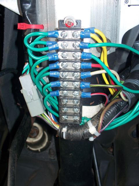1989 Ford Bronco - A close-up view of a vehicle's wiring harness, showing numerous connections and wires.