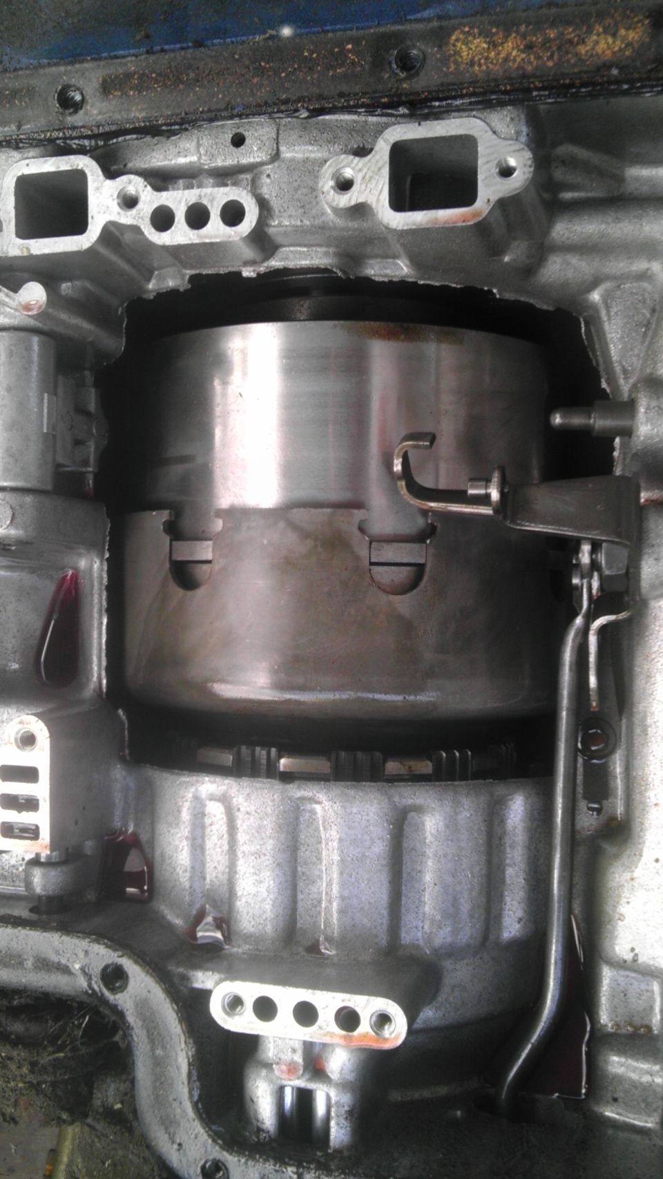 Close-up of automatic transmission internals, showing torque converter and clutch pack