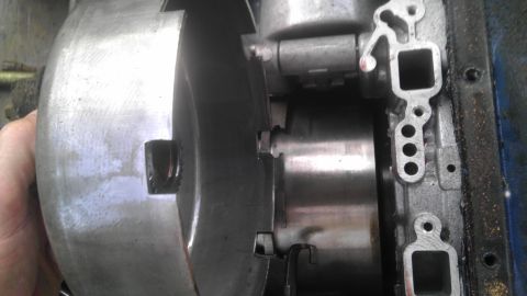 1989 Ford Bronco - Close-up view of a transmission torque converter and its housing, likely during a repair or overhaul process.