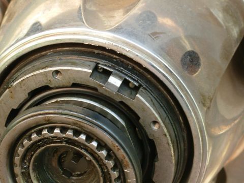 1983 Ford Bronco - This tiny "seal bridge" clip holds the flat rubber seal up between the cap & hub. It's often discarded or lost by careless mechan…