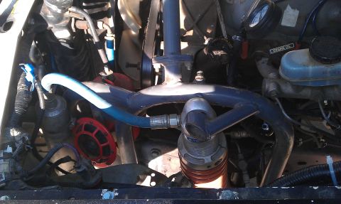1992 Ford Ranger - Close-up view of an engine bay, showing various components and hoses.