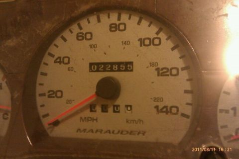 2000 Mercury Grand Marquis - Close-up of a car's speedometer and odometer displaying mileage and the word 'Marauder'.