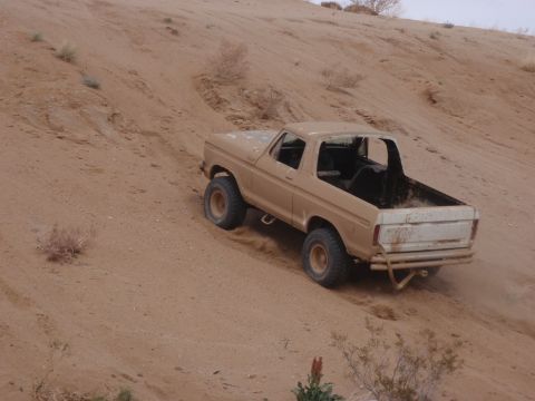 1978 Ford Bronco - This 1978 Ford Bronco is navigating a steep, sandy incline.
