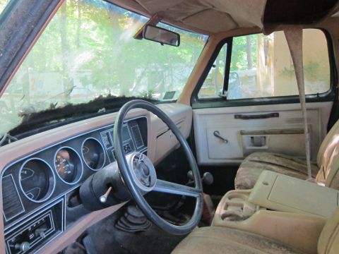 1991 Ford LTD Crown Victoria - Interior view of an old truck, showing the dashboard, steering wheel, and seats.