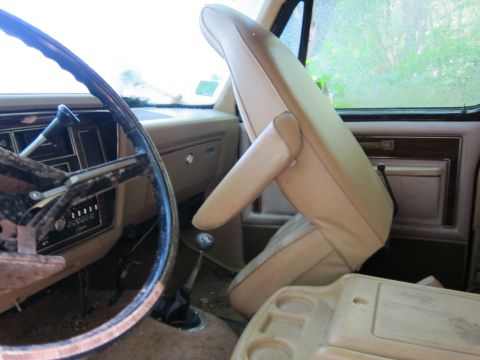 1991 Ford LTD Crown Victoria - Interior of an old car showing the driver's side, seat, and dashboard.