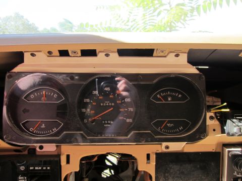 1991 Ford LTD Crown Victoria - Dashboard gauges from a vehicle, including speedometer, fuel, oil, and temperature indicators.