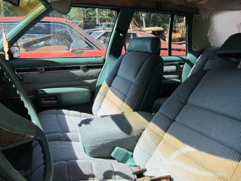 1991 Ford LTD Crown Victoria - Interior view of a 1991 Ford Crown Victoria LTD, with other vehicles seen through the windows.