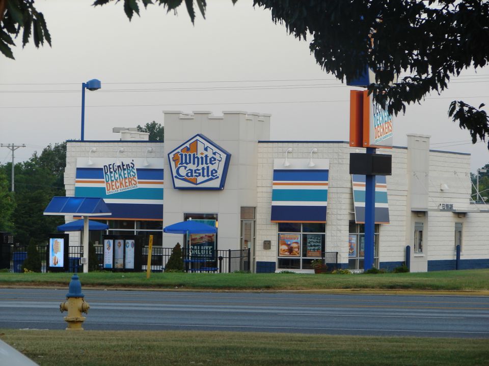 White Castle restaurant with blue awnings and signage