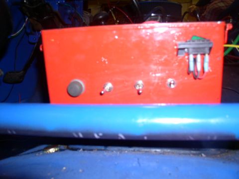 1979 Ford Bronco - A red electrical box with multiple switches and wiring is visible, likely part of a custom modification.