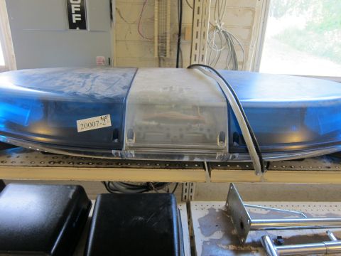 1991 Ford LTD Crown Victoria - Emergency light bar with blue lenses and a part number sticker is visible.