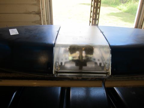 1991 Ford LTD Crown Victoria - A close-up view of a light bar, likely from a police or emergency vehicle, is shown indoors.