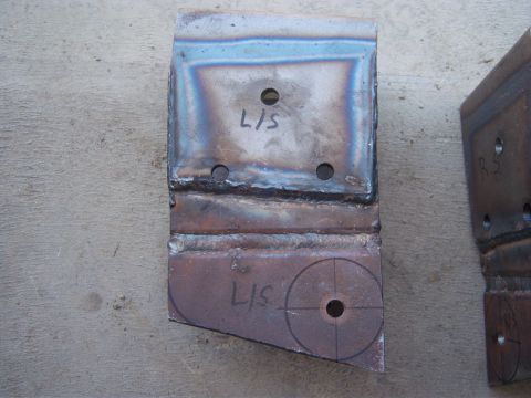1996 Ford Bronco - Custom metal bracket with 'L/S' marking, likely for automotive repair or modification.