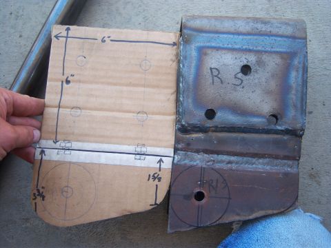 1996 Ford Bronco - A metal bracket is shown next to a cardboard template with measurements and hole markings.