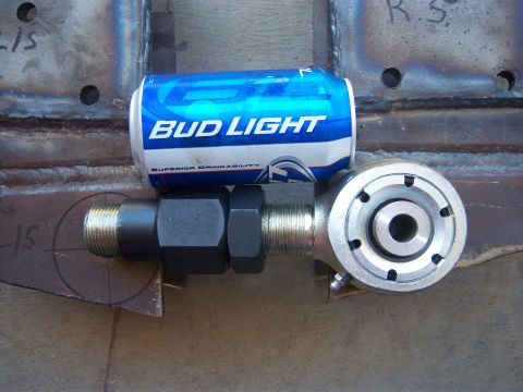 1996 Ford Bronco - A suspension component is shown next to a Bud Light can, likely for scale.