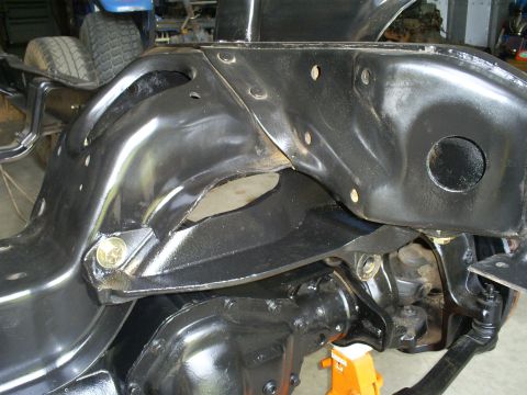 1992 Ford Bronco - Close-up view of a vehicle's frame and suspension components, likely during restoration.