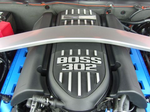 2007 Ford Mustang - Engine cover displays "BOSS 302" badging, indicating a specific performance model.