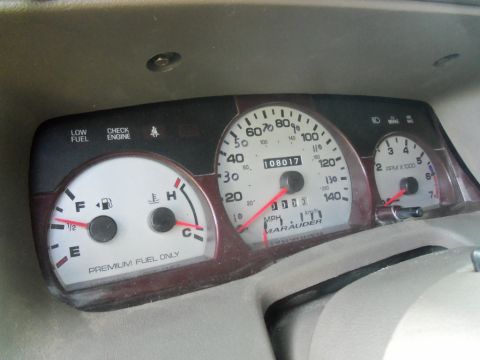 2000 Mercury Grand Marquis - Close-up of a vehicle's interior dashboard gauges, including the speedometer and tachometer. The word 'Marauder' is visible on the speedome…