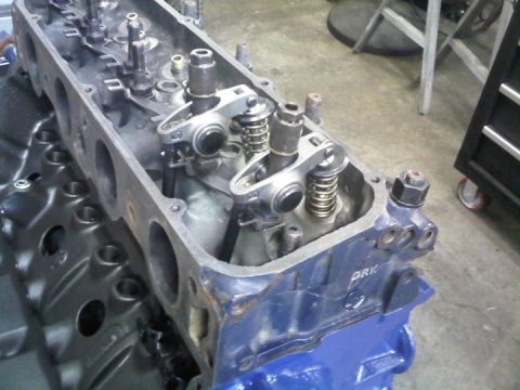 1979 Ford Bronco - Close-up view of an engine block's valve train assembly, showing internal components.