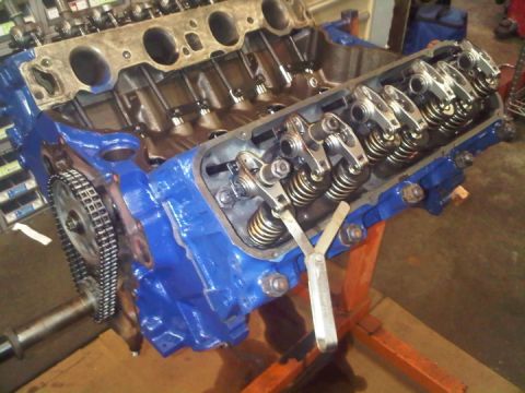 1979 Ford Bronco - Close-up view of an engine block's internal components, including the timing chain and valve train assembly.