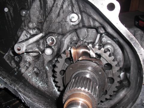 1991 Ford Bronco - Transfer case gears are broken, indicating significant internal damage.
