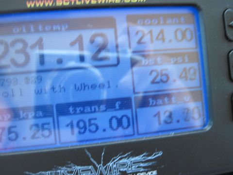1973 Ford Ranchero - A digital gauge cluster displays various vehicle metrics including oil temperature and coolant temperature.