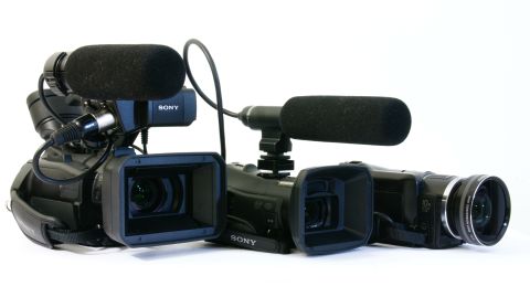 1993 Ford Taurus - Multiple Sony camcorders are displayed against a white background.