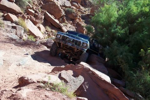 1990 Ford Bronco - Mike on the first climb obstacle up Cliffhanger (broke a 60 rear shaft here)