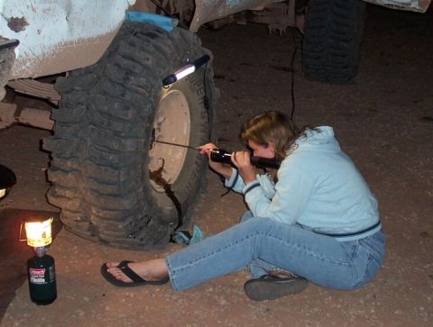 1990 Ford Bronco - Once again proving that I have the coolest gf in the world, Tanya happily fishes out broken pieces from Daves SECOND rear 60 shaft break (n…
