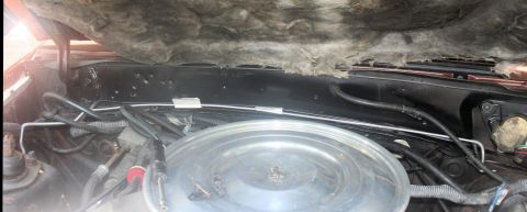 1980 Ford Mustang - View of the engine bay, showing brake lines and air cleaner assembly.
