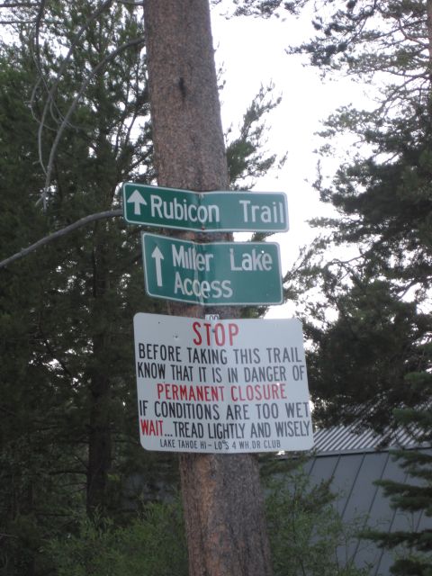 1989 Ford Bronco - Trail signs indicate directions to Rubicon Trail and Miller Lake Access, with a prominent STOP notice about permanent closure due to condit…