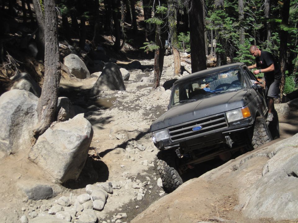 1989 Ford Bronco on a rocky off-road trail